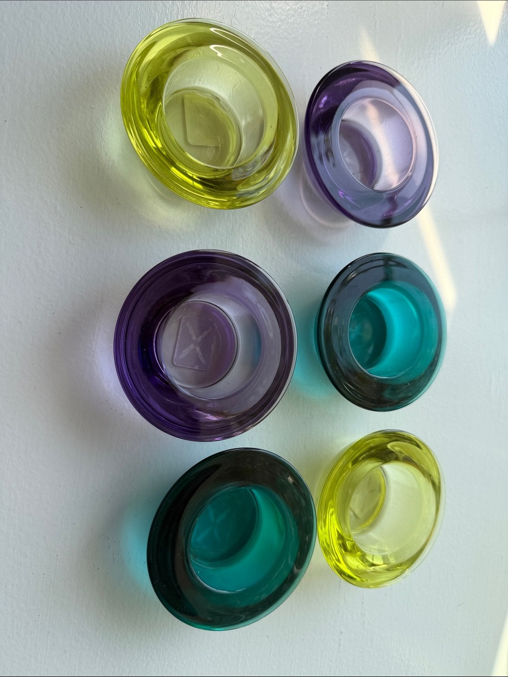 Crate&Barrel Colored Glass Votives in Purple, Teal, and Yellow-Green